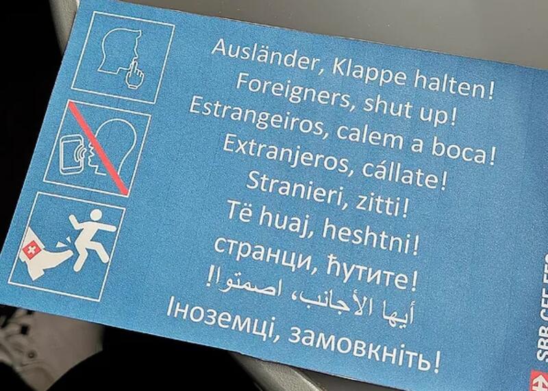 plakaty w szwajcarskich pociągach